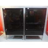 A pair of black industrial lockers