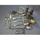A collection of 17 pieces of silver to include spoons, pepperettes and others.