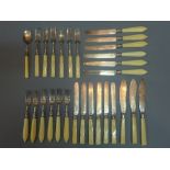 A set of bone handled silver knives and forks, London 1869/7,