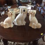 A pair of Staffordshire Dogs (Spaniels) and one other
