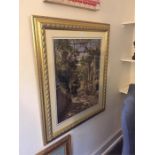 A large gilt framed print of a vine yard