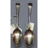 A Georgian silver serving spoons, London 1760 by Elias Cachart, and other serving spoon London,