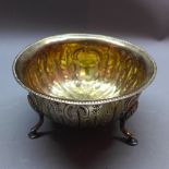 A 19th century silver footed bowl, engraved foliate design and gilt washed interior, approx.