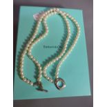 A Tiffany and Co fresh water pearl necklace choker with silver clasp and in original and box