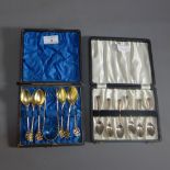 A 19th Century cased set of six silver gilt tea spoons and matching tongs with finials in the form