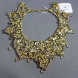 A vintage 1960s Kenneth Laine collar necklace encrusted with rhinestones and faux crystals on