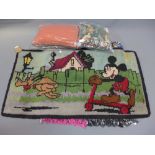 A 1960's pictorial rug depicting Mickey Mouse together with a multi coloured rug and two ebonised