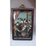 A Chinese reverse painted glass painting depicting noblemen in interior scene, 24x14.