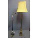 Two Victorian brass standard lamps.