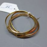 Two gold bangles, 15ct and 9ct together with yellow metal dolphin head bracelet,