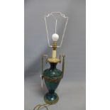 A green glazed porcelain vase later converted to a lamp with brass mounts.