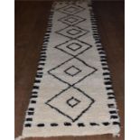 A Moroccan Beni Qurain runner with geometric lozenge design 100% lambswool