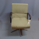 A mid 20th Century swivel chair.