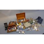 A collection of miscellaneous items to include coins, watches, cufflinks, lighters, compacts ect.