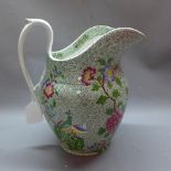 A Copeland Spoke water jug decorated with flowers,