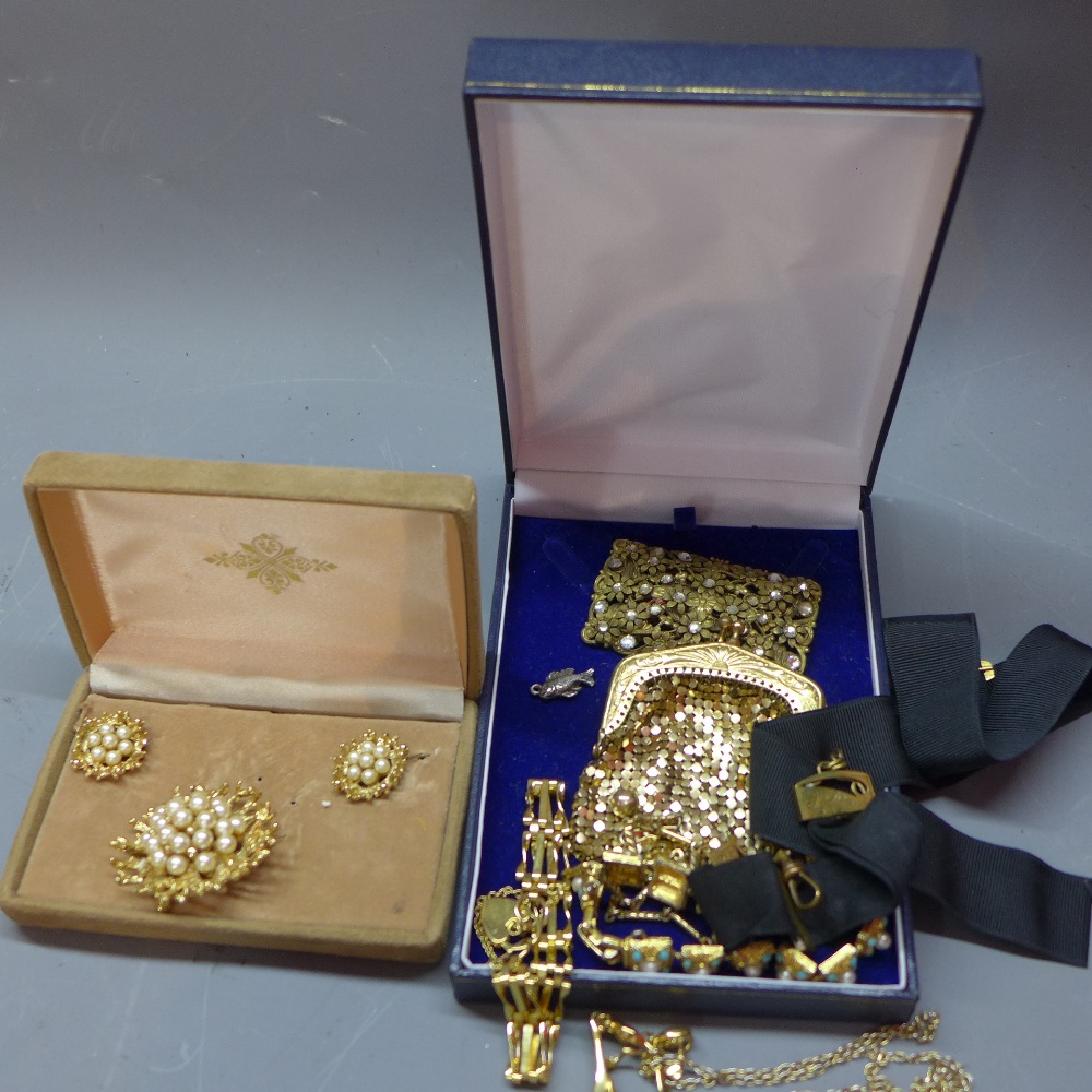 A collection of gilt metal costume jewellery to include brooches, earrings, rings and bracelets.