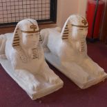 A large pair of cast stone garden ornament features in the form of Egyptian Sphinx.