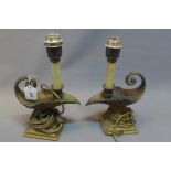 A pair of early 20th Century brass table lamps in the form of oil lamps.