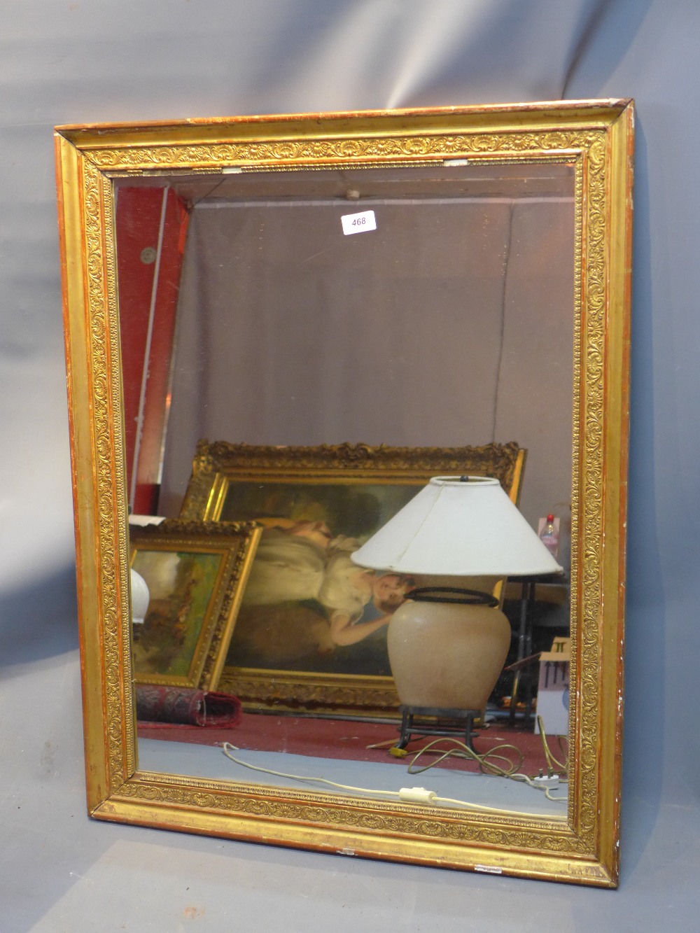 An early 20th Century gilt framed mirror.