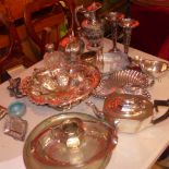 A silver mounted perfume bottle, silver basket, silver gravy boat and collection of silver plate.