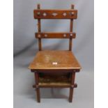 An arts and crafts oak metamorphic chair/ladder