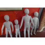 Four child manequins