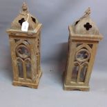 A pair of Gothic style storm lanterns.