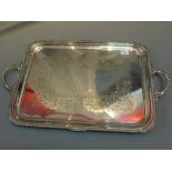 A silver plated twin handled tray.