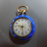 A fob watch having Arabic numerals and blue enamel case