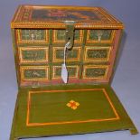A 20th Century hand painted Indian Mughai jewellery chest with drop down flap enclosing an