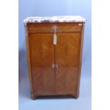 A 20th century satinwood armoire with marble top. H.116cm W.75cm D.