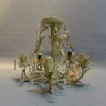 A contemporary wire work chandelier with floral decoration