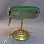 A 20th Century brass bankers lamp with green glass shade