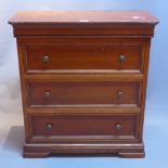 A contemporary teak chest of three drawers raised on bracket feet.