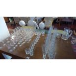 A large collection of 20th Century drinking glasses with flora acid etched design.