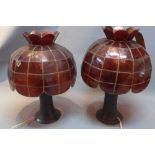 A pair of Chinese bronze vases later converted to lamps with red glass shades.