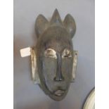 A tribal ceremonial mask.