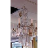 A Victorian style five branch waterfall chandelier stamped M.E.
