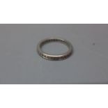 A ladies Platinum and Brilliant cut diamond wedding ring , marked LW&G 'Lawson,