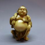 A 19th century Japanese ivory netsuke, signed. H.