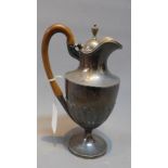 A Georgian silver claret jug, hallmarked London 1805, maker Solomon Hougham. H.