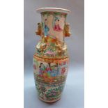 A 19th century Chinese Famille rose vase, together with matching twin handled pot. H.