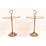 A pair of bronze Occasional tables, with ring handles