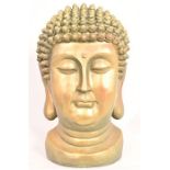 A gold head of a Buddha