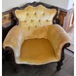 A Small Buttoned Back Armchair