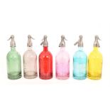 Six Soda Syphons bottles, various colours