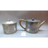 A Georgian silver teapot with matching silver tea caddy, hallmarked London 1782,