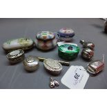 A collection of six silver trinket boxes,