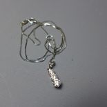 A ladies 18ct white gold necklace, having three diamond drop pendant. Marked 750.