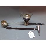 A silver candle snuffer, hallmarked Birmingham 1994,